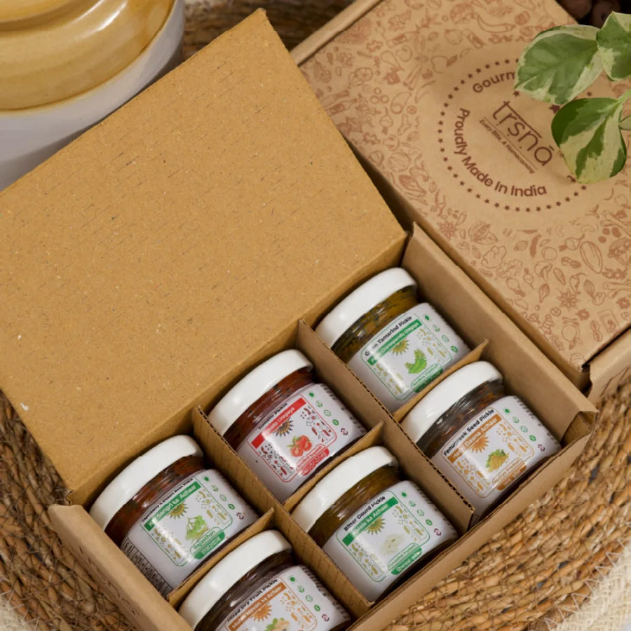 The Trsna Discovery Pack box holding six mini jars